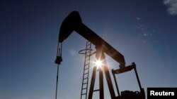 Crude oil pump jack in the Permian Basin in Loving County