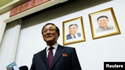 North Korean Ambassador to China Ji Jae Ryong arrives for a news conference in Beijing, Jan. 29, 2014. 