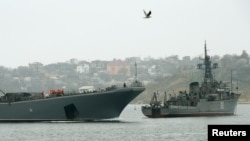 Russian Navy ships block the entrance to the Crimean port of Sevastopol, March 7, 2014. Russia's President Vladimir Putin rebuffed a warning from U.S. President Barack Obama over Moscow's military intervention in Crimea, saying on Friday that Russia could