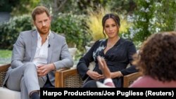 Britain's Prince Harry and Meghan, Duchess of Sussex, are interviewed by Oprah Winfrey in this undated handout photo. (Harpo Productions/Joe Pugliese/Handout via REUTERS/File Photo)