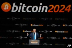 แฟ้มภาพ - โดนัลด์ ทรัมป์ เมื่อครั้งเป็นตัวแทนพรรครีพับลิกันในการเลือกตั้งปธน.สหรัฐฯ ขึ้นเวทีงานประชุมบิตคอยน์ 2024 เมื่อ 27 ก.ค. 2567 ที่เมืองแนชวิลล์ รัฐเทนเนสซี