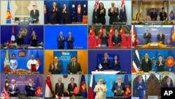 Arhiva - Fotografija Vijetnamske novinske agencije napravljena tokom onlajn konferencije pokazuje lidere država i ministre trgovina 15 zemalja članica Sveobuhvatnog ekonomskog partnerstva (RCEP), u Hanoju, 15. novembra 2020.