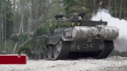 ཨ་རི་དང་འཇར་མན། དབྱིན་ཇིའི་ལྕགས་ཁྲབ་འཁོར་ལོ་ངོ་སྤྲོད། 