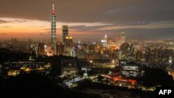 FILE - This photo taken on Nov. 5, 2018 shows the Taipei skyline at sunset.