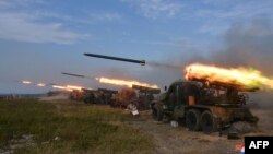 د شمالي کوریا دولتي خبري اژانس ددغه هېواد د اوږده واټن ویشتونکو توغندیو دا تصویر په ۲۰۲۲ کې خپور کړ.