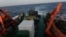 FILE - Image from a Vietnam Coast Guard ship on May 13, 2014 shows a covered gun-machine on the deck during a patrol near China's oil drilling rig in disputed waters in the South China Sea. 