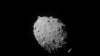This image provided by NASA shows the asteroid Dimorphos, captured by NASA’s DART mission just two seconds before the spacecraft struck its surface, on Sept. 26, 2022. (NASA/Johns Hopkins APL via AP)