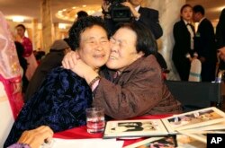 South Korean Jo Soon-jeon, 83, right, hugs her North Korean youngest sister Jo Kwi Nyo during the Separated Family Reunion Meeting in 2015.