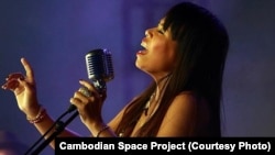 Lead singer Channthy Kak performs with Cambodian Space Project