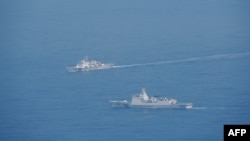 На цій фотографії, зробленій 23 травня 2024 року та опублікованій Міністерством оборони Тайваню 24 травня 2024 року, видно кораблі берегової охорони Китаю у невідомій локації поблизу Тайваню (Роздаткове фото: МІНІСТЕРСТВО ОБОРОНИ ТАЙВАНЮ / AFP)