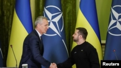 NATO Secretary-General Stoltenberg and Ukraine's President Zelenskiy on a joint news briefing in Kyiv