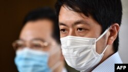 Former Hong Kong lawmaker Ted Hui — pictured outside West Kowloon Court in Hong Kong on Aug. 24, 2020 — says China wants to terrorize its critics overseas into silence. Hui lives in Australia.