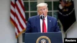 特朗普总统在白宫玫瑰园举行的新冠病毒疫情记者会上讲话。(2020年4月14日)