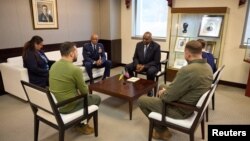 Президент України Володимир Зеленський на зустрічі з главою Пентагону Ллойдом Остіном та начальником об'єднаних штатів США Чарльзом Брауном. У складі делегації України - посолка України у США О.Маркарова та глава Офісу президента А.Єрмак. 11 грудня 2023 року. Фото: Reuters