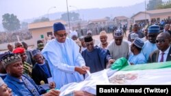 Le président Muhammadu Buhari inaugure le port fluvial de Baro dans l'Etat du Niger, Nigeria, le 19 janvier 2019.