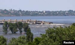 Probijena brana u Hersonu (Foto: Reuters/Alexey Konovalov/TASS/Handout)