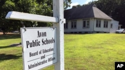 FILE - The board of education offices in Avon, Conn. is seen in this July 12, 2019 photo. 