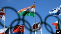 北韓國旗在南韓平昌奧運村飄揚（美聯社）