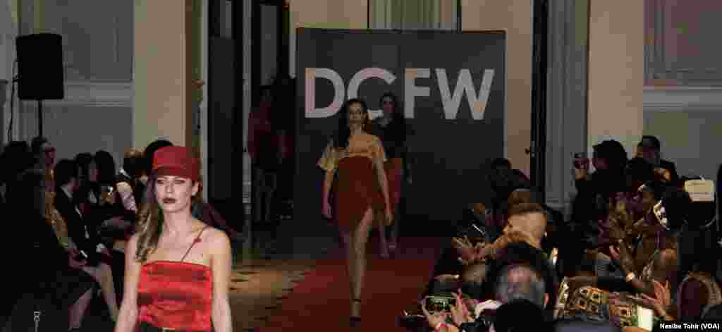 A fragment of the artwork 'Honour' from the series 'Five Elements of War', created by Ukrainian artists Daniel Green and Daria Marchenko, is on display at a studio in Kyiv. The artwork is made of bullet and shell cartridges from the frontline of a military conflict in eastern Ukraine, shoulder straps and other military items.