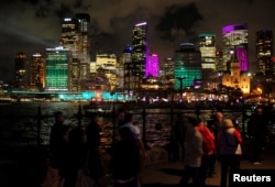 Office building are lit with colorful projections of light on the first night of the Sydney Vivid Festival light and sound show in Sydney, Australia, May 26, 2017.