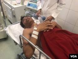 Ros Sitha, 40, a worker, survived being trapped in the rubble of a collapsed building in Sihanoukville for more than 2½ days, June 24, 2019 (Sun Narin/VOA Khmer)