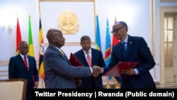 Rais Paul Kagame and Rais Yoweri Museveni