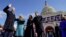 Joe Biden is sworn in as the 46th president of the United States by Chief Justice John Roberts as Jill Biden holds the Bible during the 59th Presidential Inauguration at the U.S. Capitol in Washington, Jan. 20, 2021. 