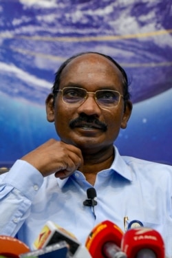 Chairman of the Indian Space Research Organisation (ISRO) Kailasavadivoo Sivan gestures as he announces ISRO's plans for 2020.