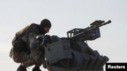 Mpiganaji wa jimbo la Donetsk anayeungwa mkono na wanajeshi wa Russia.