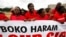 Women sing slogans during a demonstration calling on the government to rescue the kidnapped girls of the government secondary school in Chibok. Abuja, Nigeria, May 28, 2014.