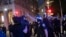 A police officer shouts at Associated Press videojournalist Robert Bumsted, Tuesday, June 2, 2020, in New York. New York City police officers surrounded, shoved and yelled expletives at two Associated Press journalists covering protests Tuesday in…