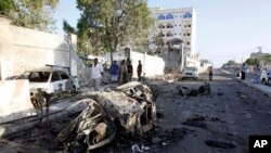 Wreckage is seen after an attack outside the Jazeera Hotel in Mogadishu, Jan. 2, 2014. 