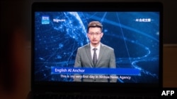 This photo illustration shows a man watching an artificial intelligence (AI) news anchor from a state-controlled news broadcaster, on his computer in Beijing, Nov. 9, 2018.