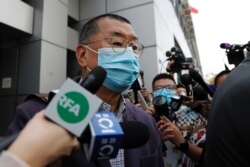 Media mogul Jimmy Lai leaves a police station after being arrested for illegal assembly during the anti-government protests in Hong Kong, China, Feb. 28, 2020.