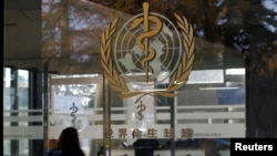 FILE - A logo is pictured on the World Health Organization (WHO) headquarters in Geneva, Switzerland on November 22, 2017. (REUTERS/Denis Balibouse/File Photo)