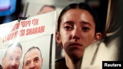 အစ္စရေးနဲ့ ဟားမတ်စ် အပစ်အခတ်ရပ်စဲရေးပေါ် ထောက်ခံကြိုဆိုသူများ (REUTERS/Nir Elias TPX)