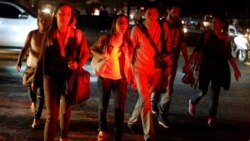 People walk on the street during a blackout in Caracas, Venezuela, March 7, 2019.