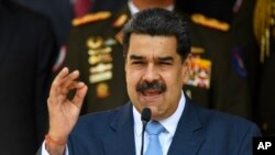Le président vénézuélien Nicolas Maduro donne une conférence de presse au palais présidentiel de Miraflores à Caracas, Venezuela, le jeudi 12 mars 2020. (Photo: Matias Delacroix/AP)