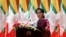  Myanmar's State Counsellor and de facto leader Aung San Suu Kyi delivers a televised speech to the nation at the Myanmar International Convention Center in Naypyitaw, Myanmar, Sept. 19, 2017.