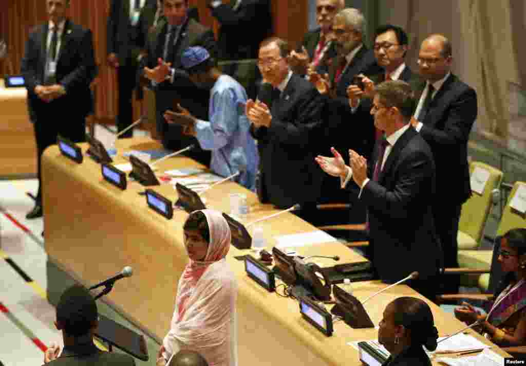 Ten new priests who were ordained by Pope Francis lay on the ground during a ceremony in St. Peter's Basilica at the Vatican.