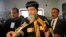 Pope Tawadros II, pope of the Coptic Orthodox church, casts his vote in a referendum on the new Egyptian constitution at a polling station in Cairo January 14, 2014. Egyptians began voting on Tuesday in a constitutional referendum, the first ballot since 