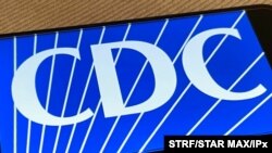 Picha ya nembo ya idara ya kudhibiti na kuzuia magonjwa Marekani CDC .