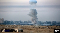 ផ្សែងហុយឡើង​ក្រោយ​ទាហាន​អ៊ីស្រាអែល​ទម្លាក់​គ្រាប់បែក​ពី​អាកាស​លើ​ទីក្រុង Rafah នៅ​តំបន់ហ្កាហ្សា កាលពីថ្ងៃទី៣១ ខែឧសភា ឆ្នាំ២០២៤។ 