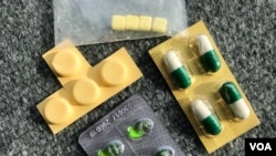 A cocktail of medicines that general outpatients received from a pharmacy when asked to cure a cold, Phnom Penh, Cambodia, May 24, 2018. (Khan Sokummono/ VOA Khmer)