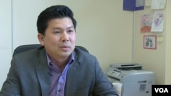 Ok Tolayuth, a Cambodian-American who runs a foster care agency in Lowell.