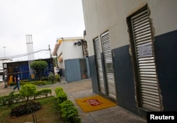 A view of the bathroom doors at the gasoline station where U.S. swimmers Ryan Lochte, Jimmy Feigen, Jack Conger and Gunnar Bentz were accused by staff of having caused damage, in Rio de Janeiro, August 18, 2016.