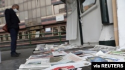 A newspaper with a front picture of Joe Biden is seen at a newsstand in Tehran, Iran, Nov. 8, 2020. (Majid Asgaripour/WANA (West Asia News Agency) via Reuters) 