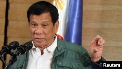 Philippine President Rodrigo Duterte speaks during a news conference in Davao after Norwegian national Kjartan Sekkingstad was freed from the al Qaeda-linked Abu Sayyaf Islamist militant group in Jolo, Sulu in southern Philippines September 18, 2016. (REUTERS/Lean Daval Jr)
