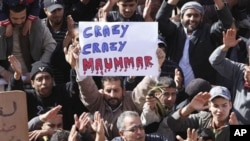 Libyan protesters protest against Libyan leader Moammar Gadhafi, in Tobruk, Libya, February 23, 2011