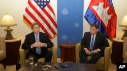 FILE PHOTO - U.S. Deputy Assistant Secretary for Southeast Asia Patrick Murphy, left, talks as the U.S.Ambassador to Cambodia William Heidt, right, listens during a press conference in Phnom Penh, Cambodia, Wednesday, Dec. 13, 2017. 